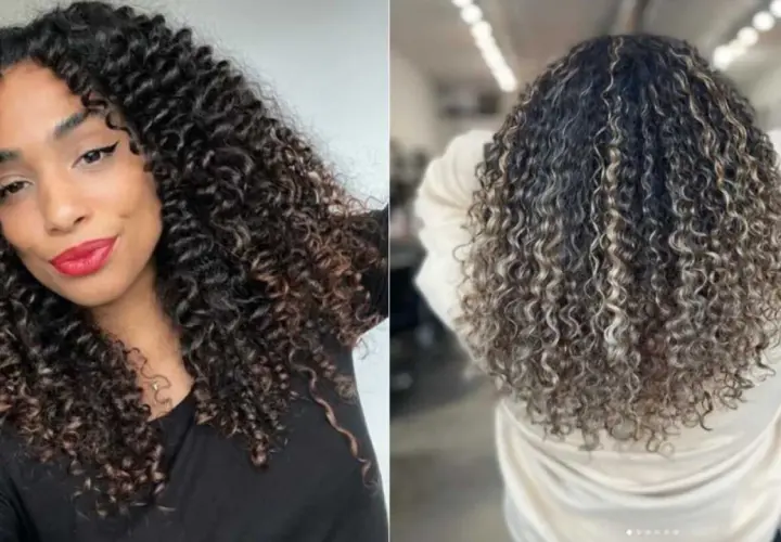 Cabello rizado con balayage y mechas rubias, un look vibrante y lleno de vida.