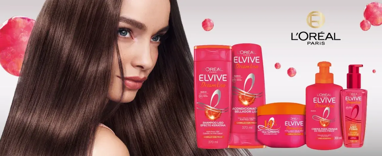 Mujer con pelo liso y sedoso, junto a productos L'Oréal Elvive Dream Liso para un cabello sin frizz.