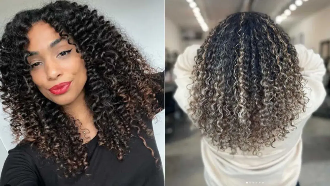 Cabello rizado con balayage y mechas rubias, un look vibrante y lleno de vida.